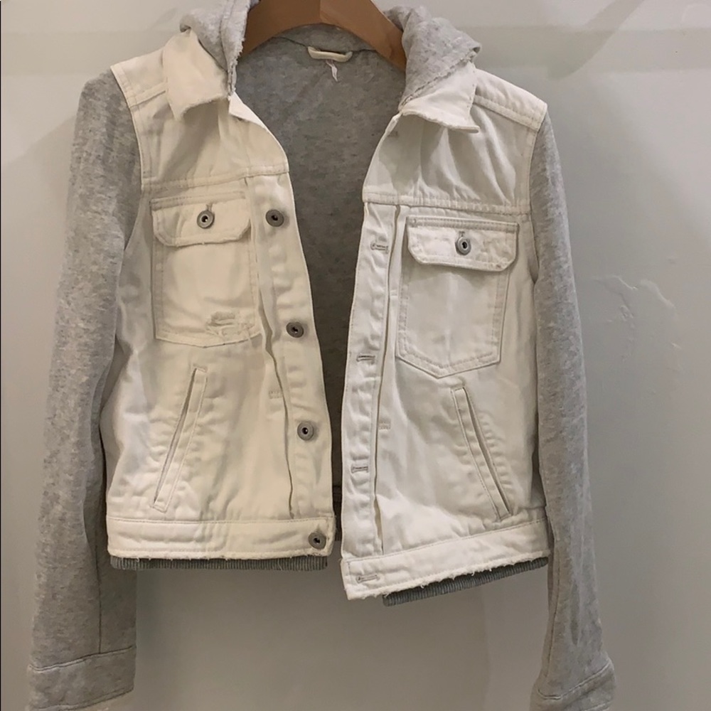 free people white denim jacket with gray hoodie